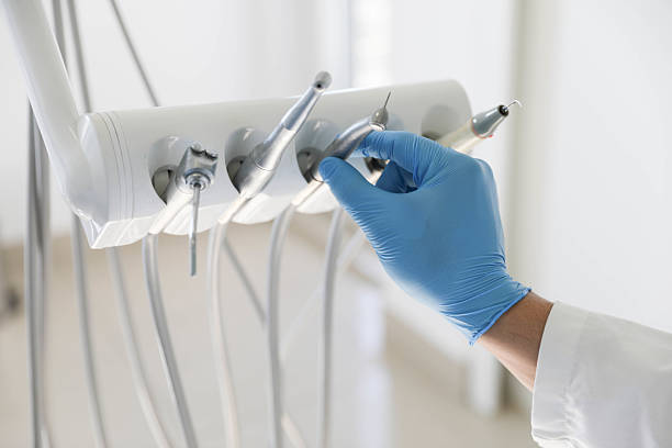 Professional Emergency Dentist technician working in Adrian, MI